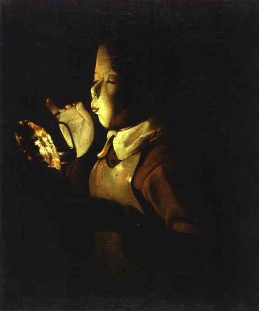 Boy Blowing At Lamp