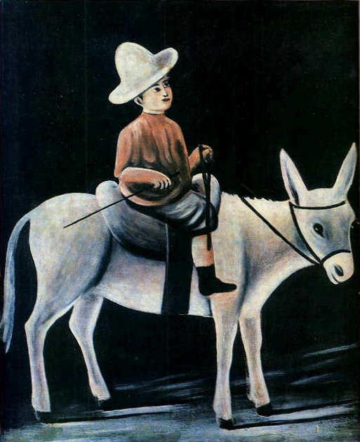 Little Boy Riding A Donkey