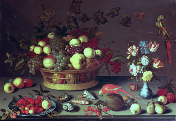 A basket of Grapes and other fruit